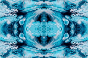 a blue and white abstract design with a large flower in the center