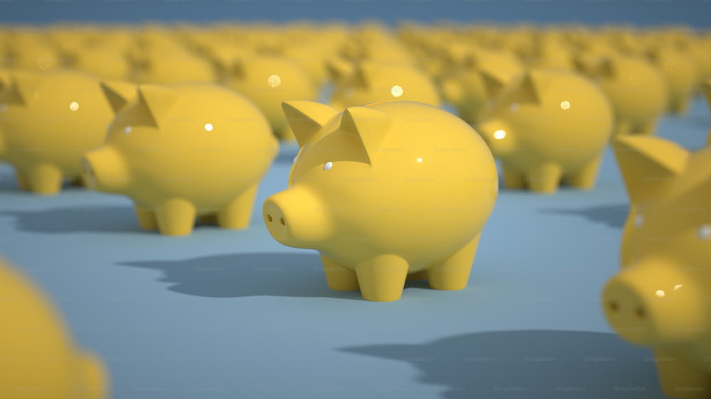 a group of yellow piggy banks sitting in a row
