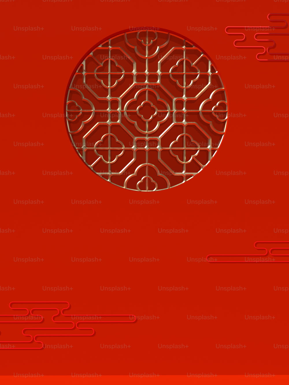 a red wall with a circular design on it