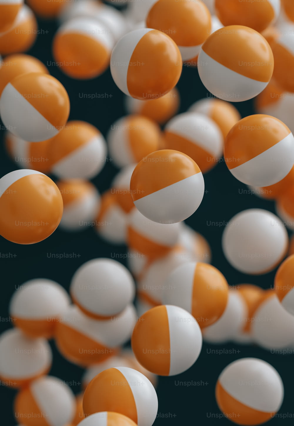 a group of orange and white balls floating in the air