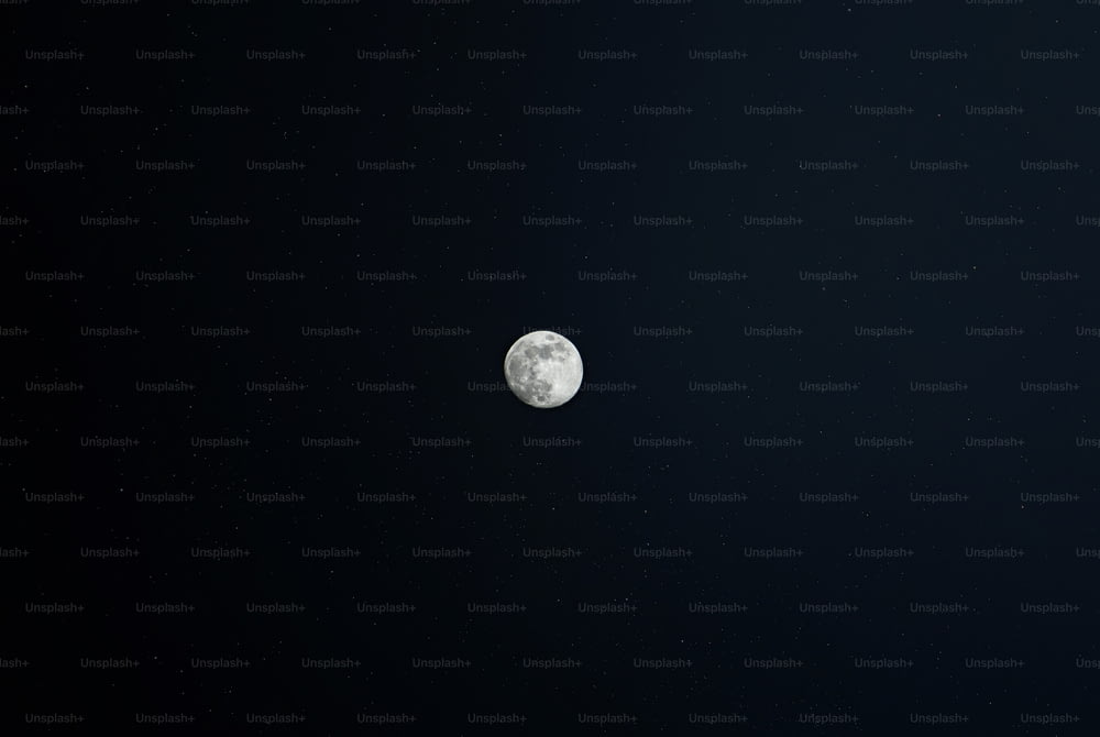 a view of the moon in the night sky