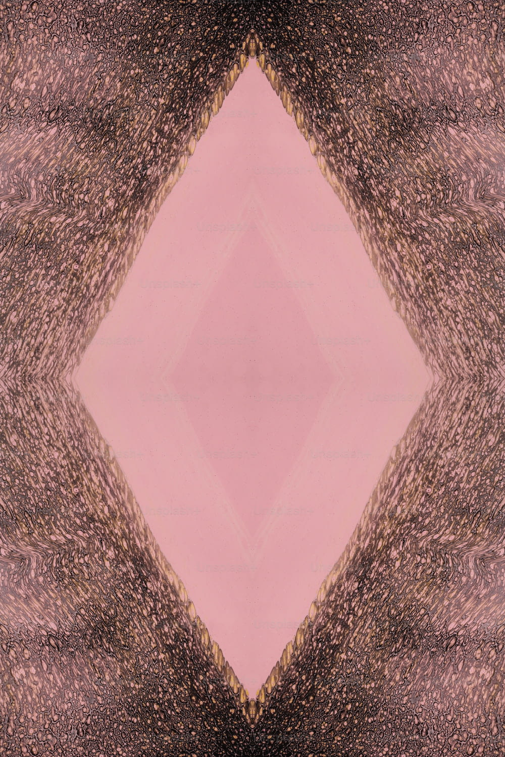 a pink and brown square with a black background