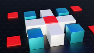 a group of cubes sitting on top of a black surface