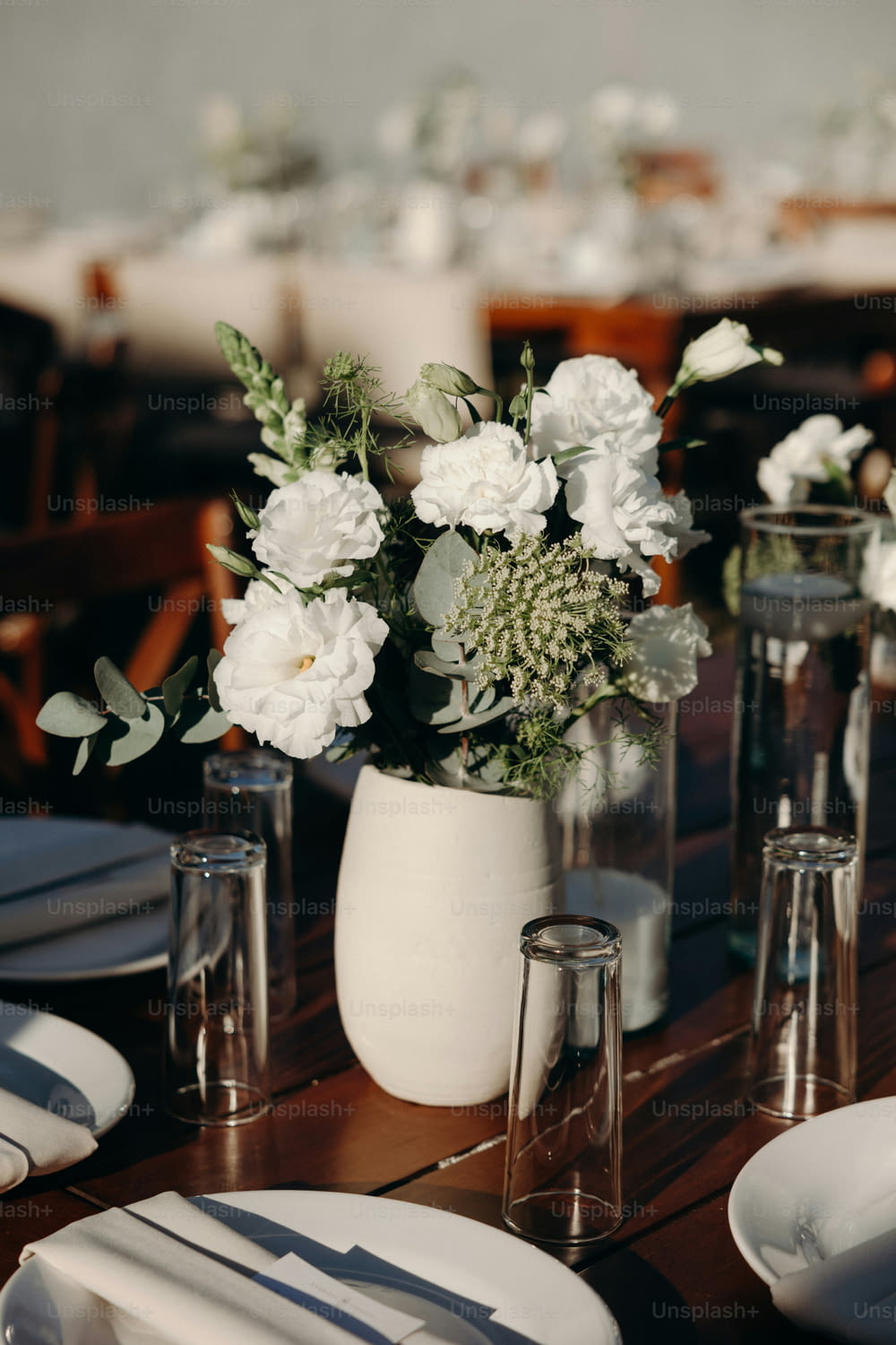 a table with a vase of flowers on it