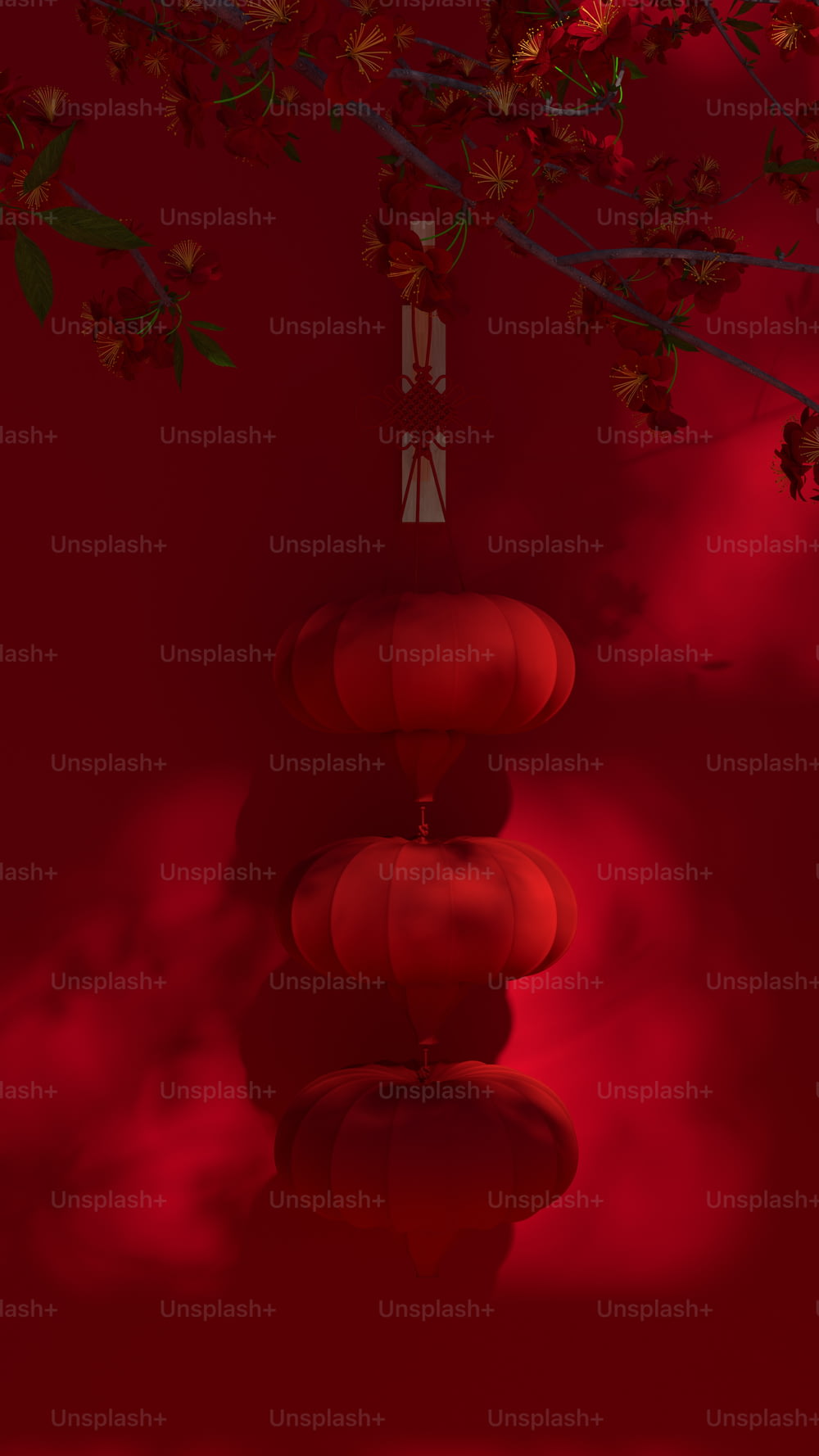 a red background with red lanterns hanging from a tree