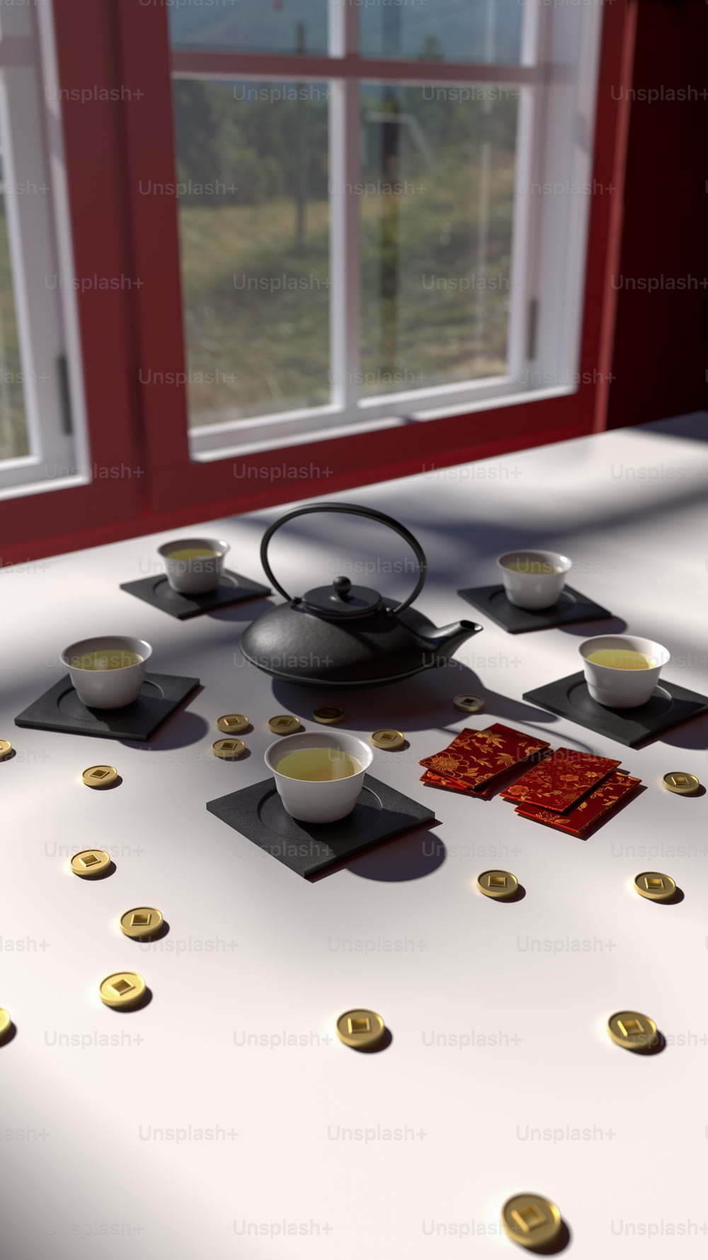 uma mesa com um conjunto de chá e xícaras sobre ele