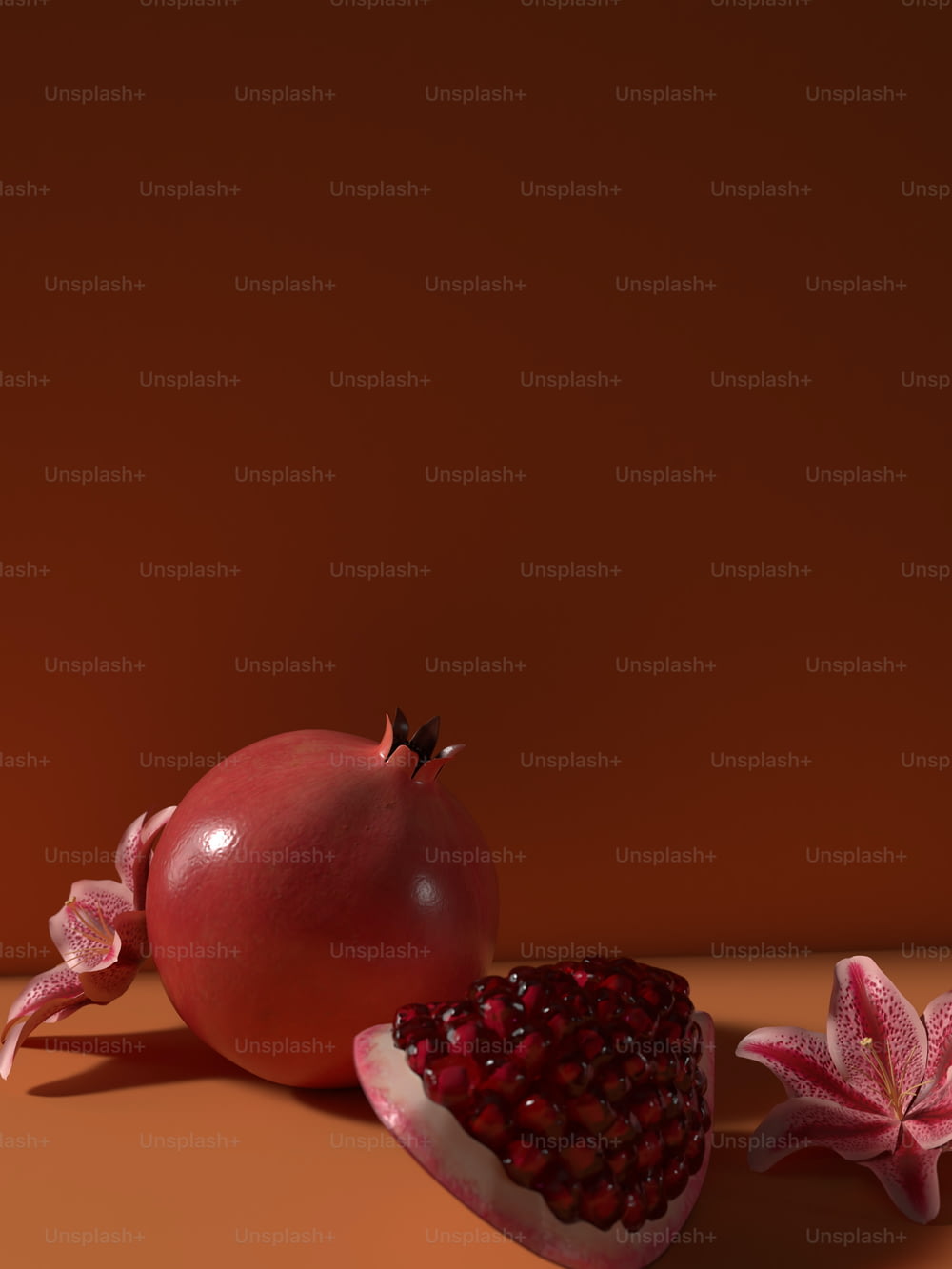 una granada y una flor sobre una mesa