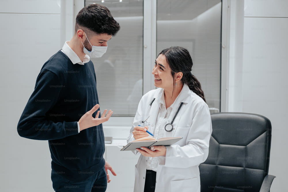 a doctor talking to a patient in an office