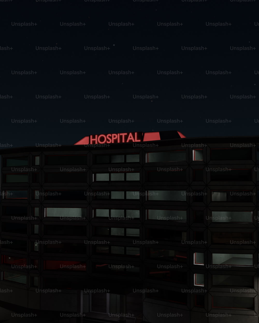 a hospital building lit up at night time