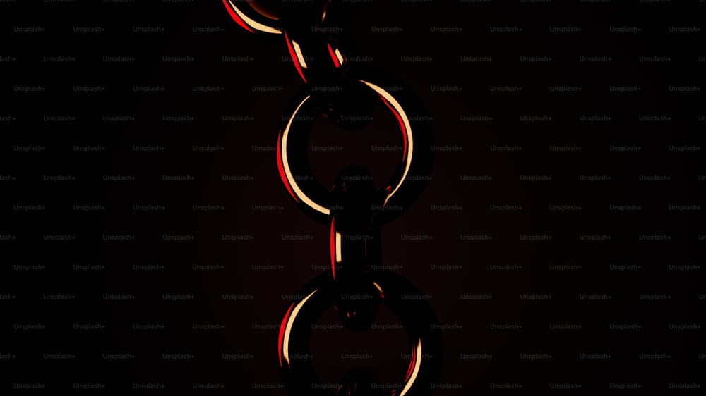 a red and black photo of a chain on a black background