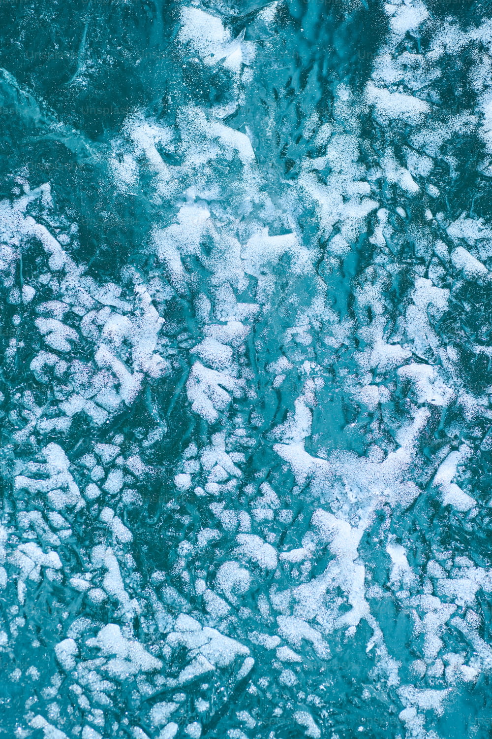an aerial view of snow on the ground