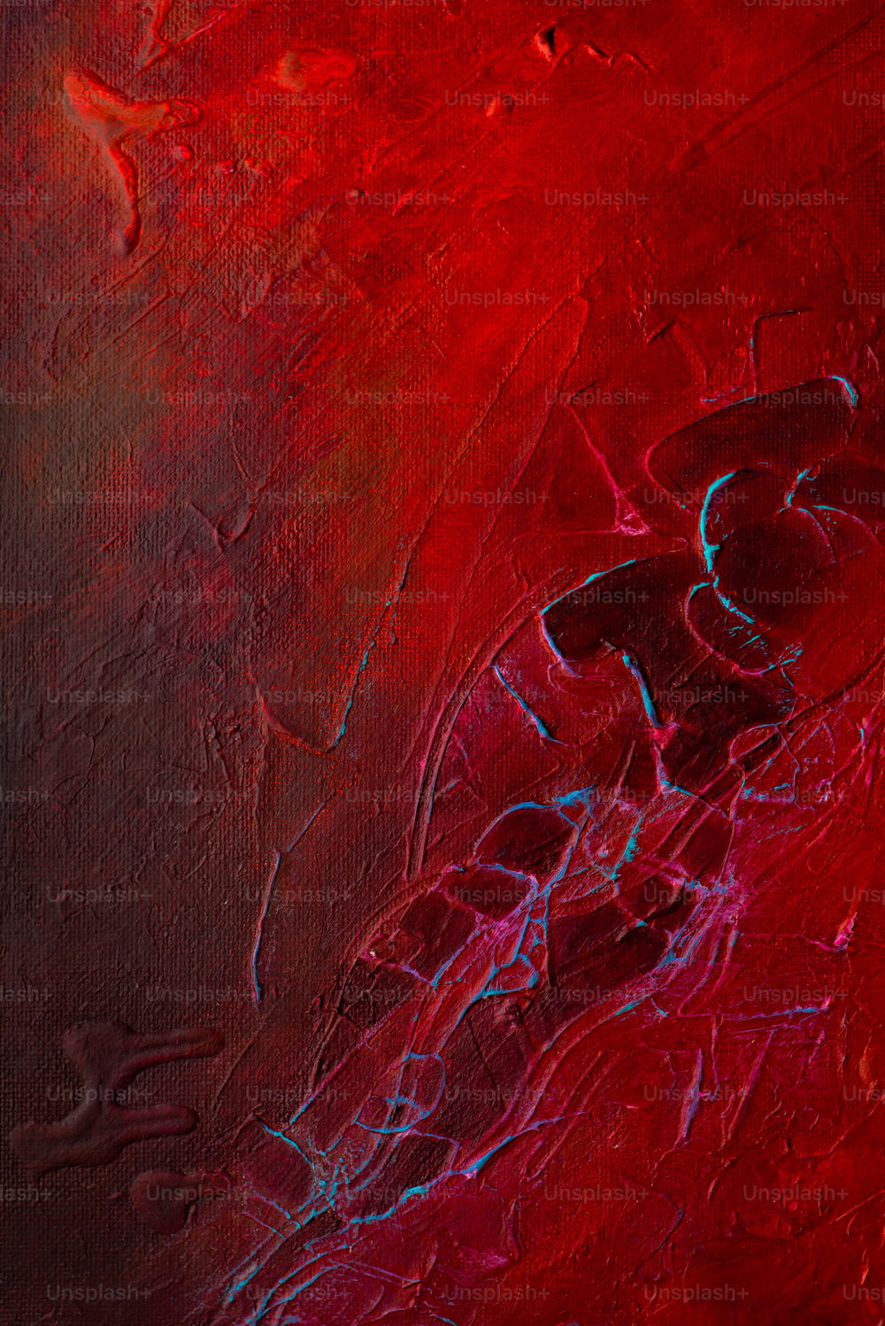 an abstract painting of red and blue colors