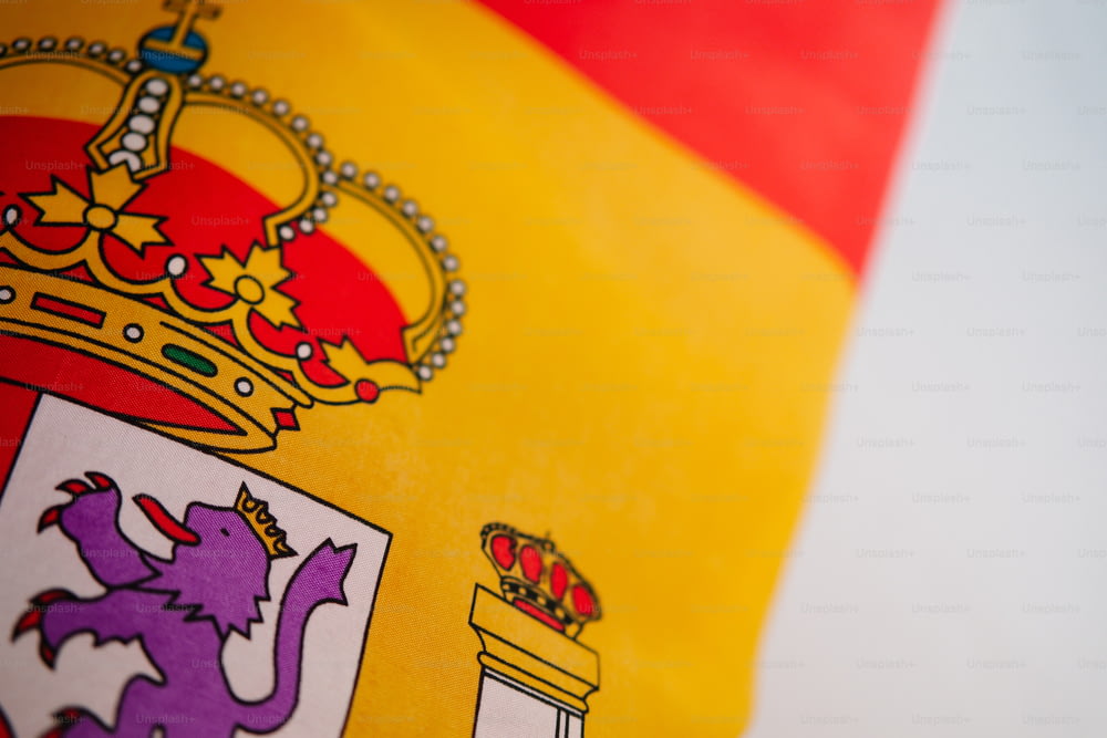 a close up of a flag with a crown on it