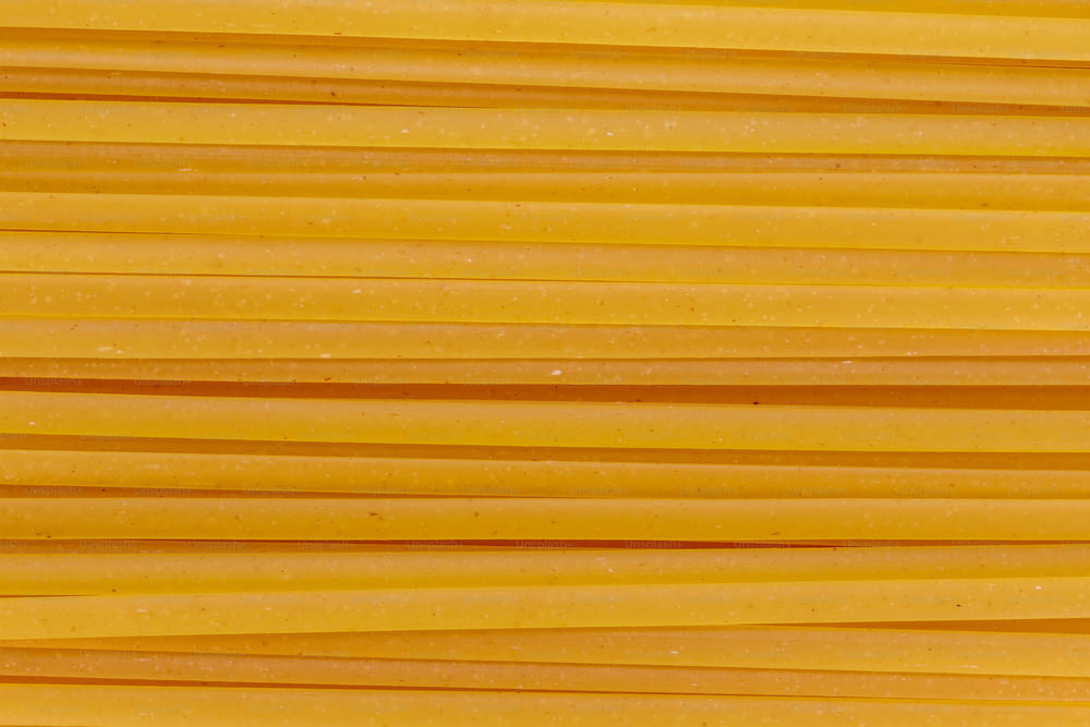 a close up of a bunch of yellow pasta