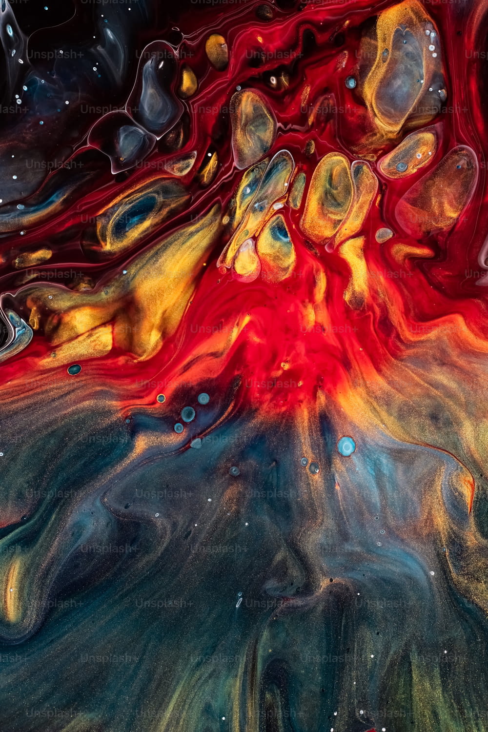 an abstract painting with red, yellow, and blue colors