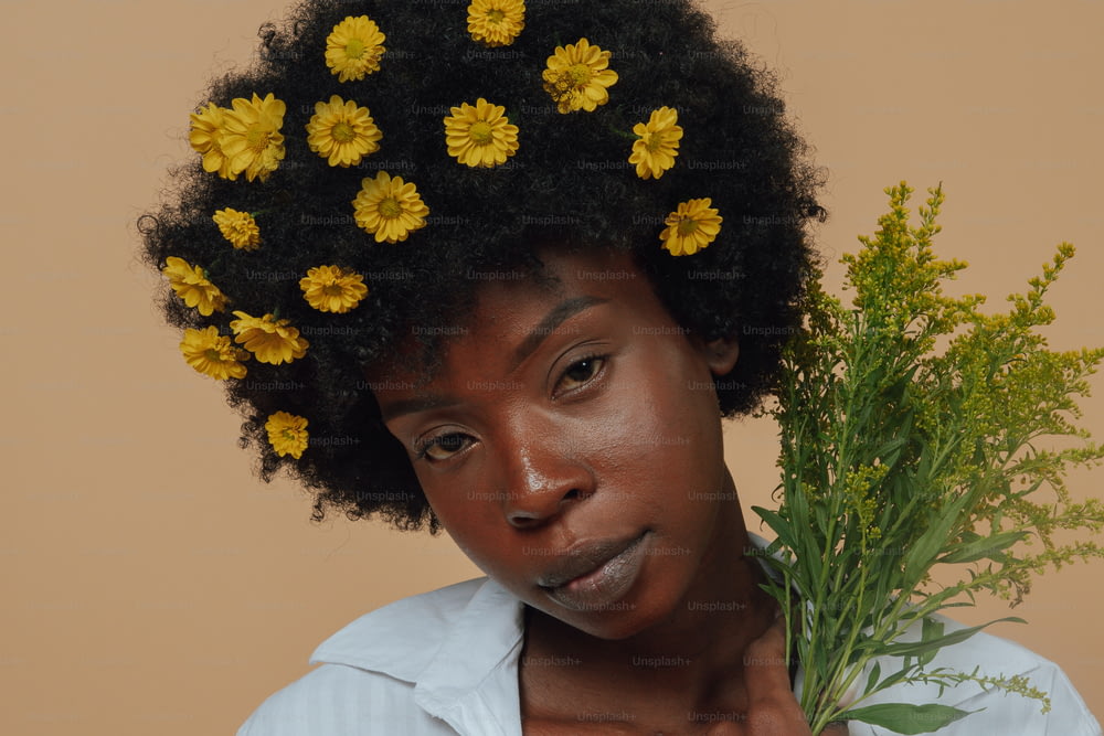 a woman with a bunch of flowers on her head
