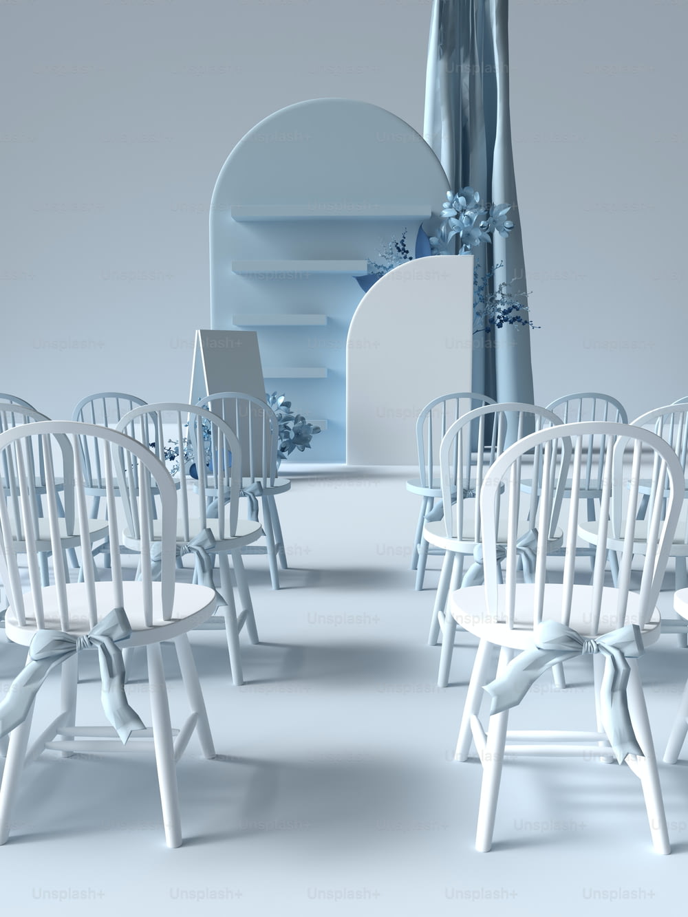 a set of white chairs and a table in a room