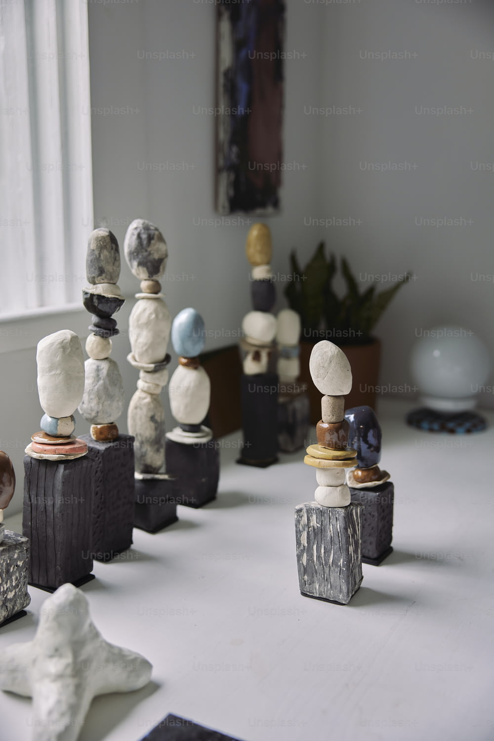 a group of small sculptures sitting on top of a table