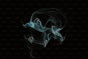 a black background with smoke in the air