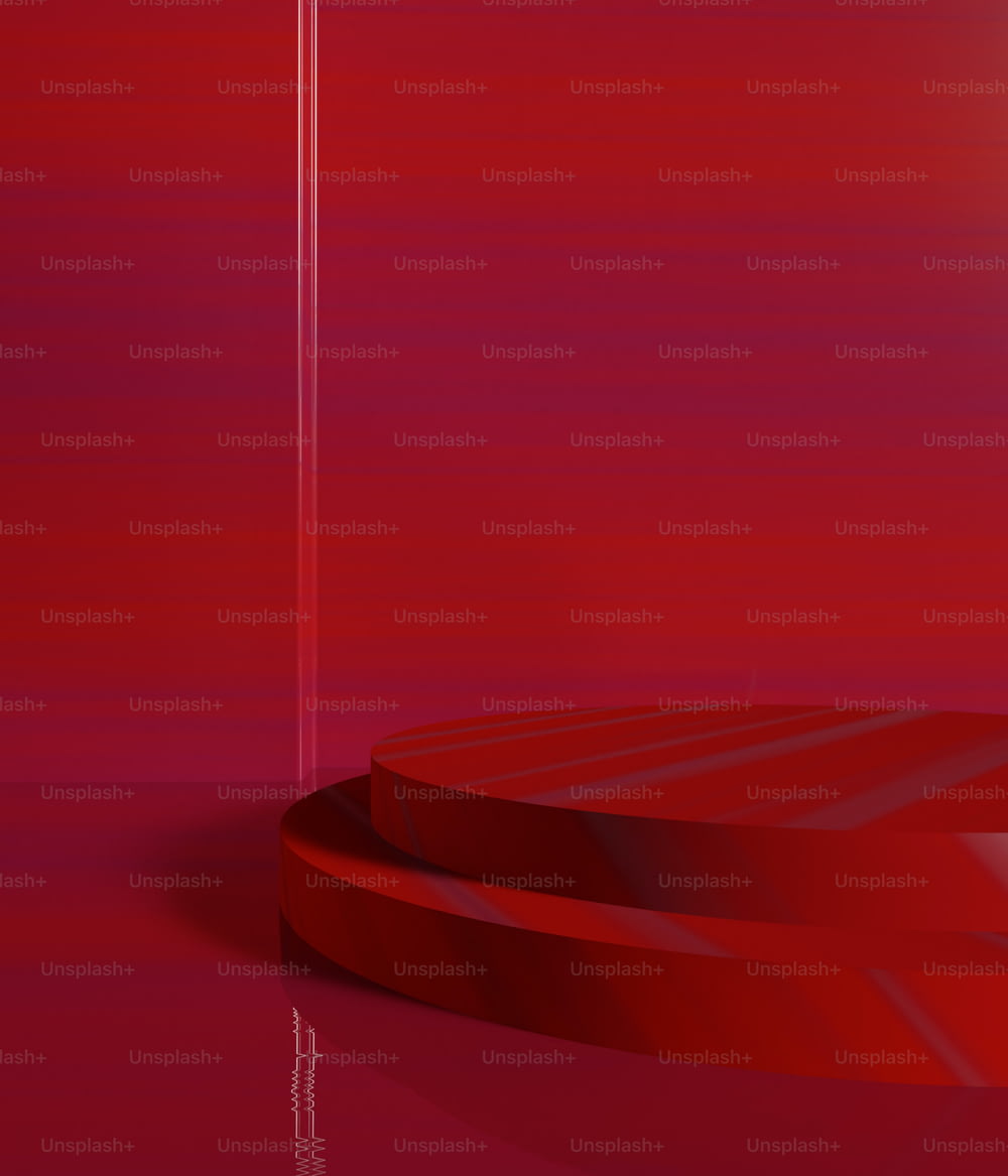 a red circular object on a red background