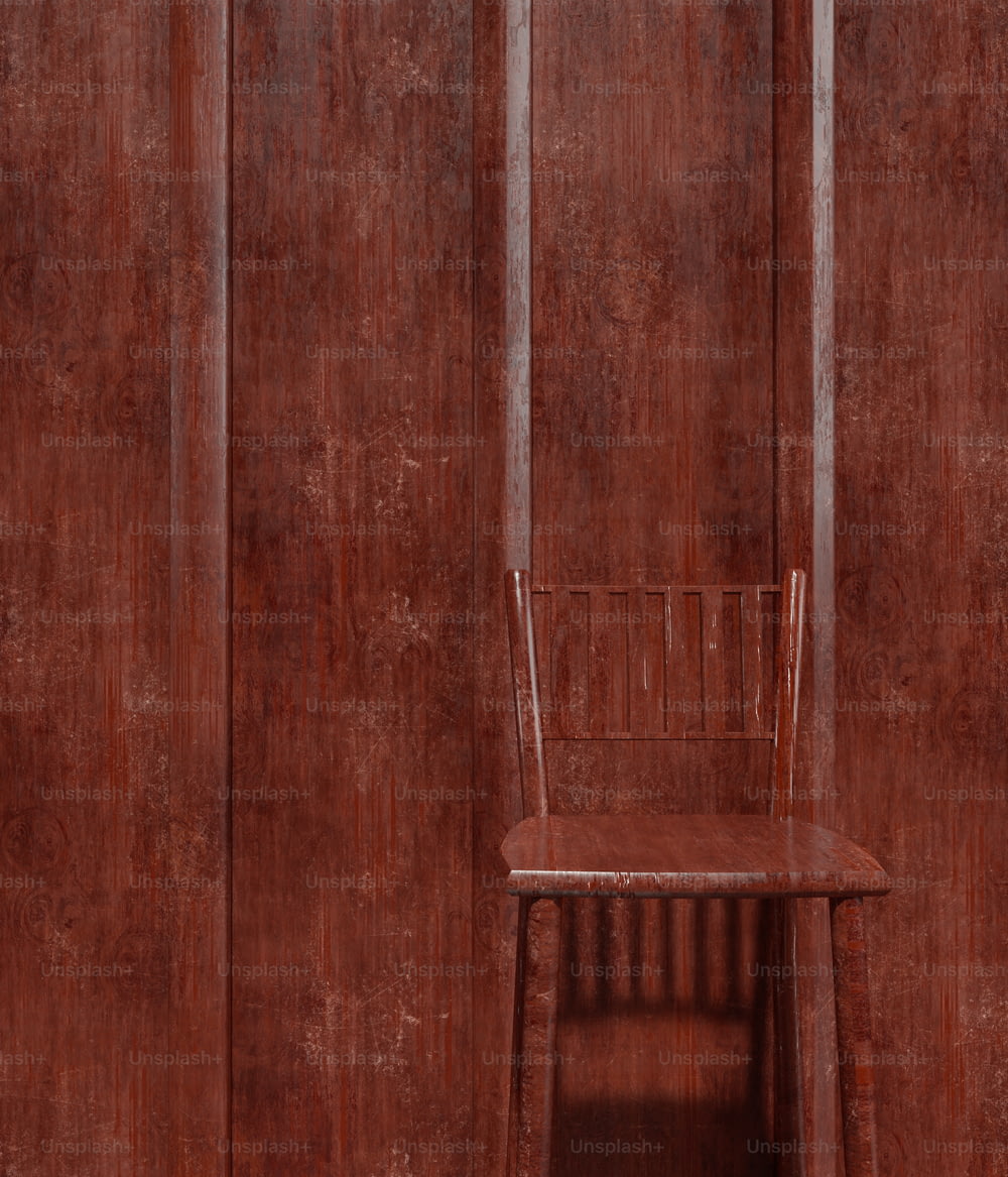a wooden chair sitting in front of a wooden wall