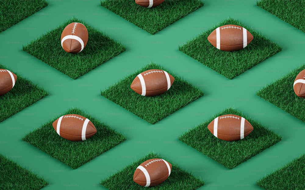 a pattern of footballs sitting on top of green grass