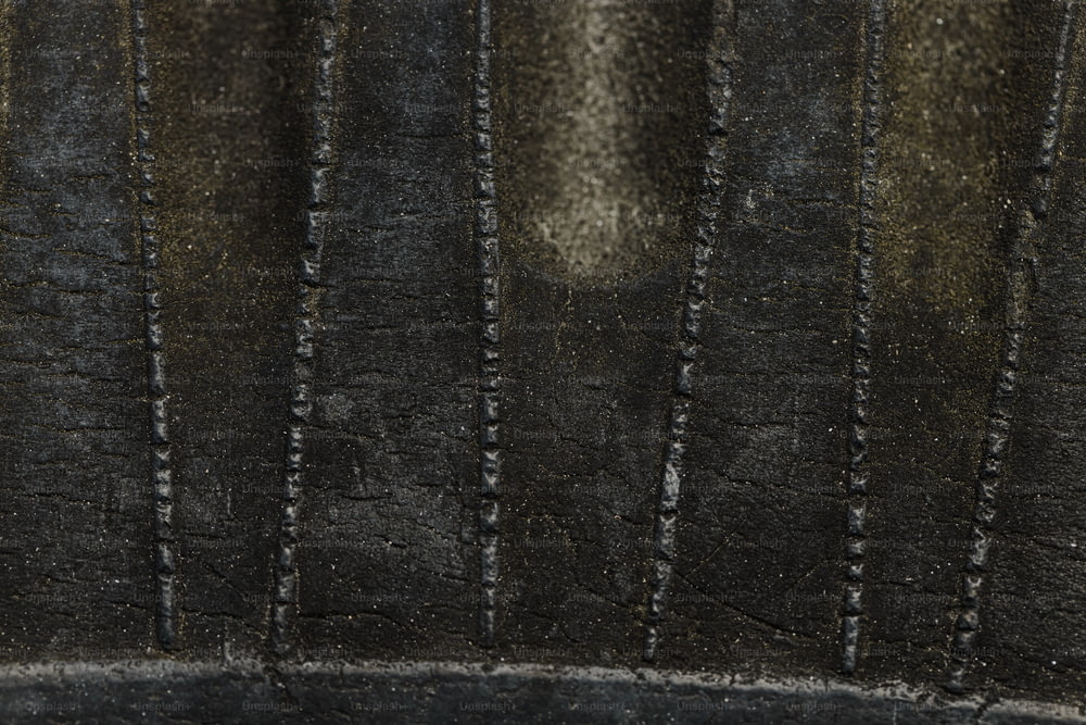 a close up of a piece of black leather