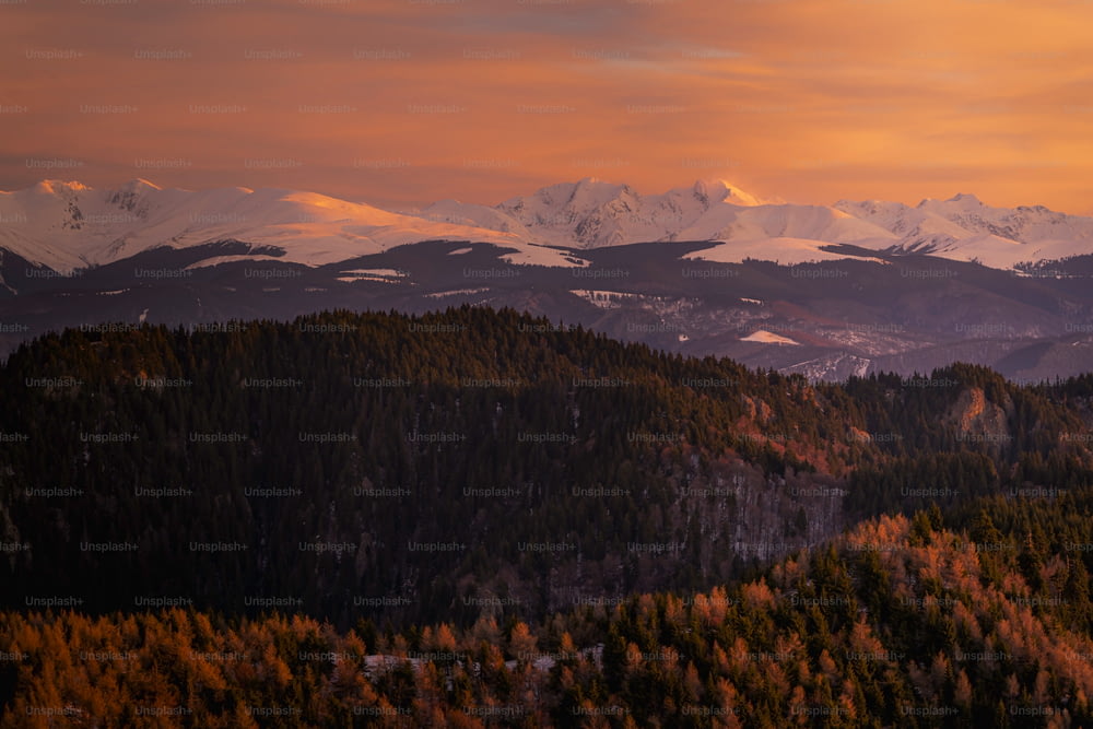a view of a mountain range at sunset