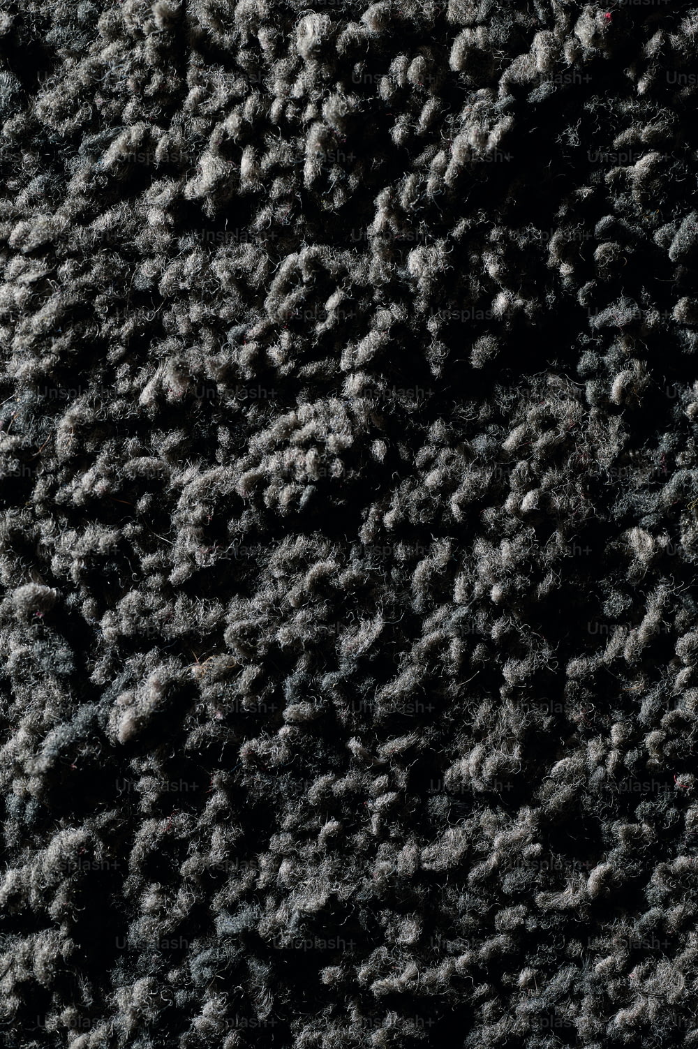a close up of a black and white carpet