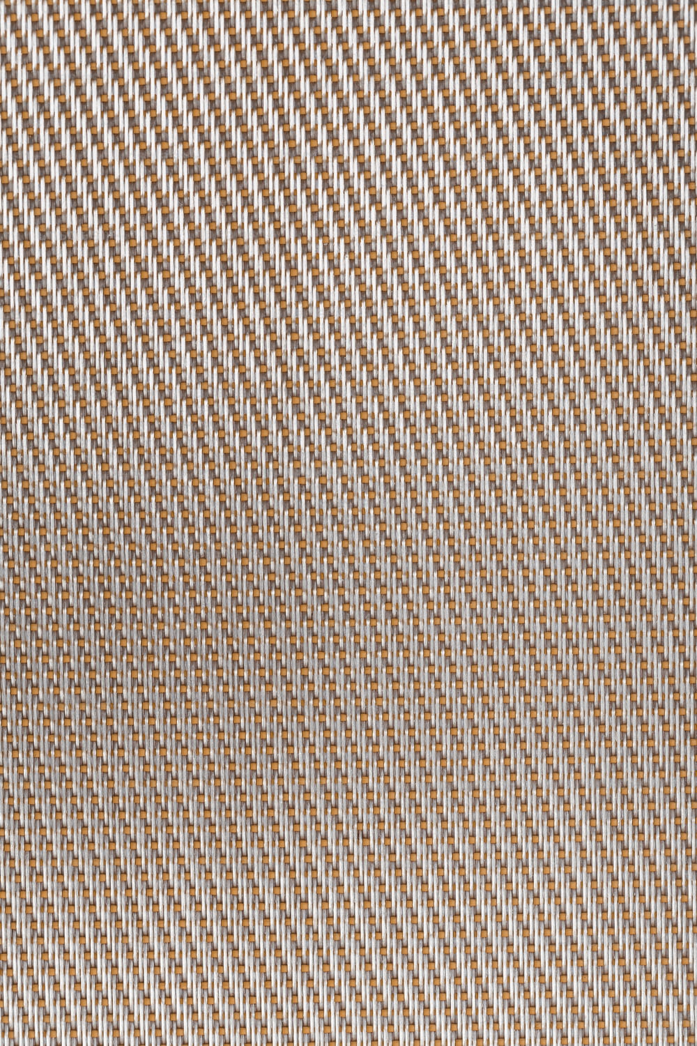 a close up view of a brown and white checkered fabric