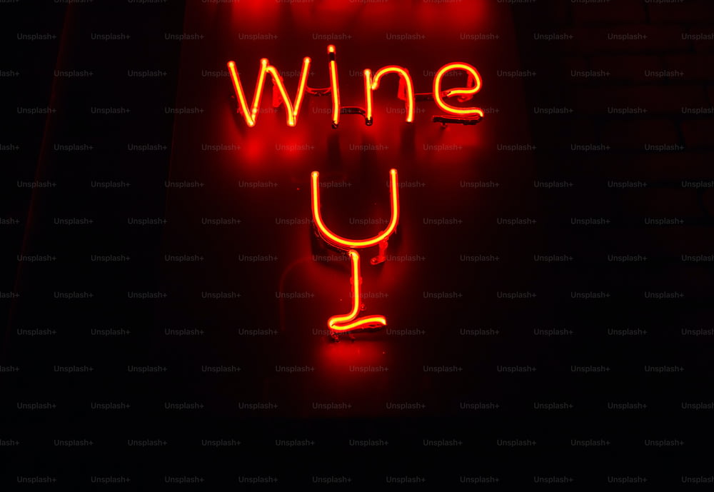 a neon sign that says wine on it