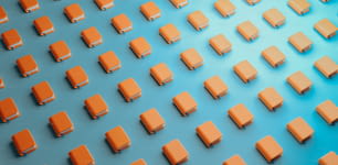 a group of orange square shaped objects on a blue surface