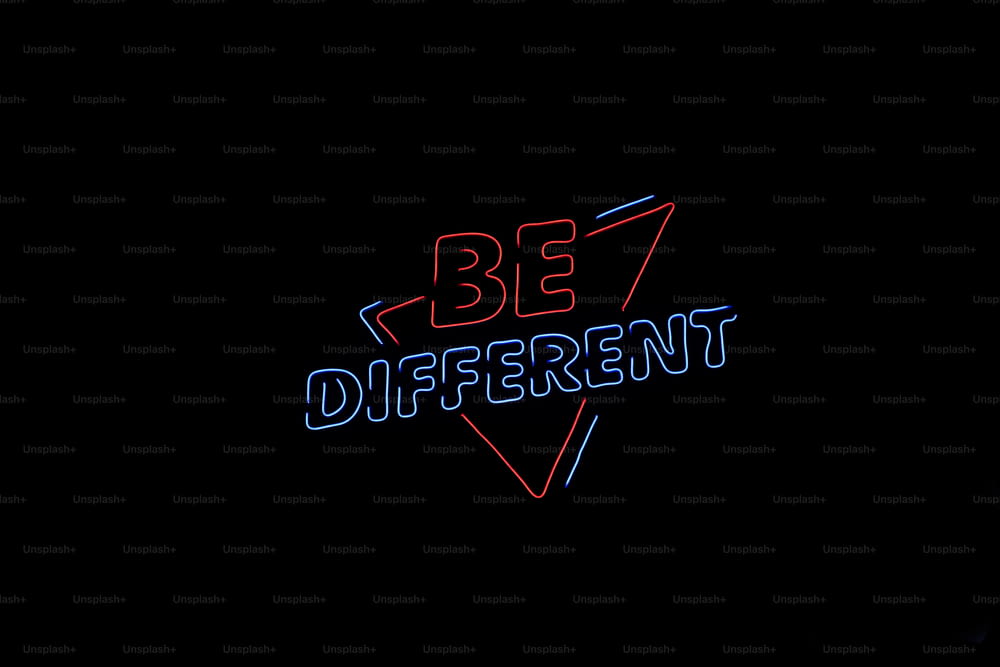 a neon sign that says be different