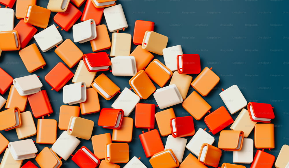 a pile of orange and white square shaped objects