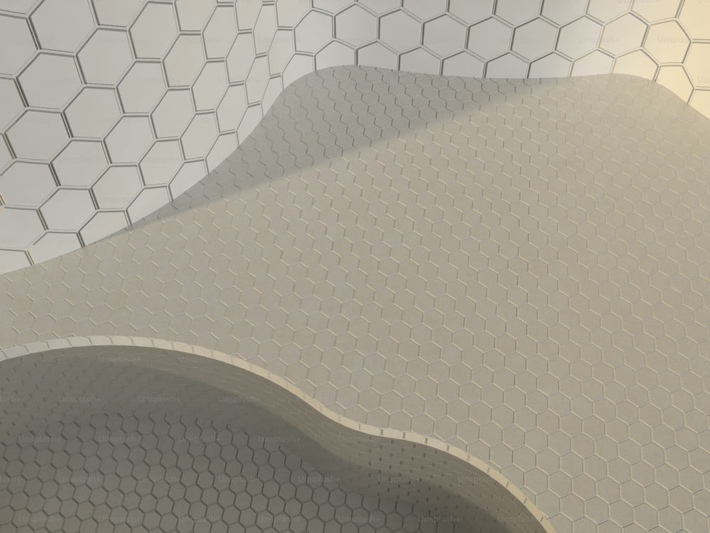 um close up de uma parede de azulejos brancos com formas hexagonais