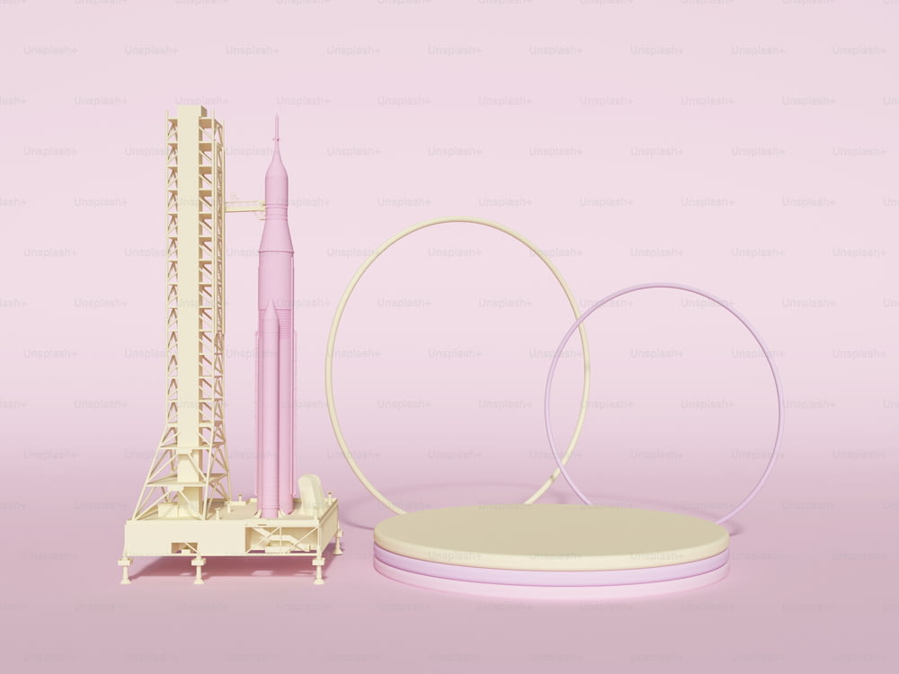 Ein rosa-weißes Modell einer Rakete und ihr Ständer