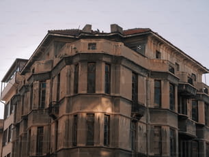 an old building with many windows and balconies