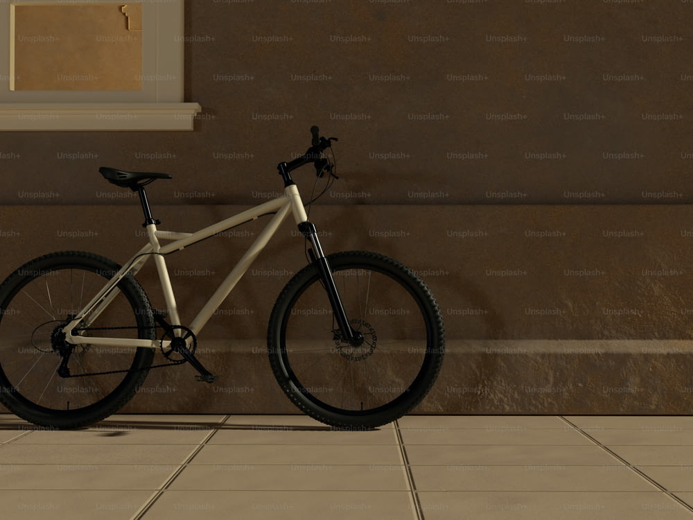 a white bike parked in front of a wall