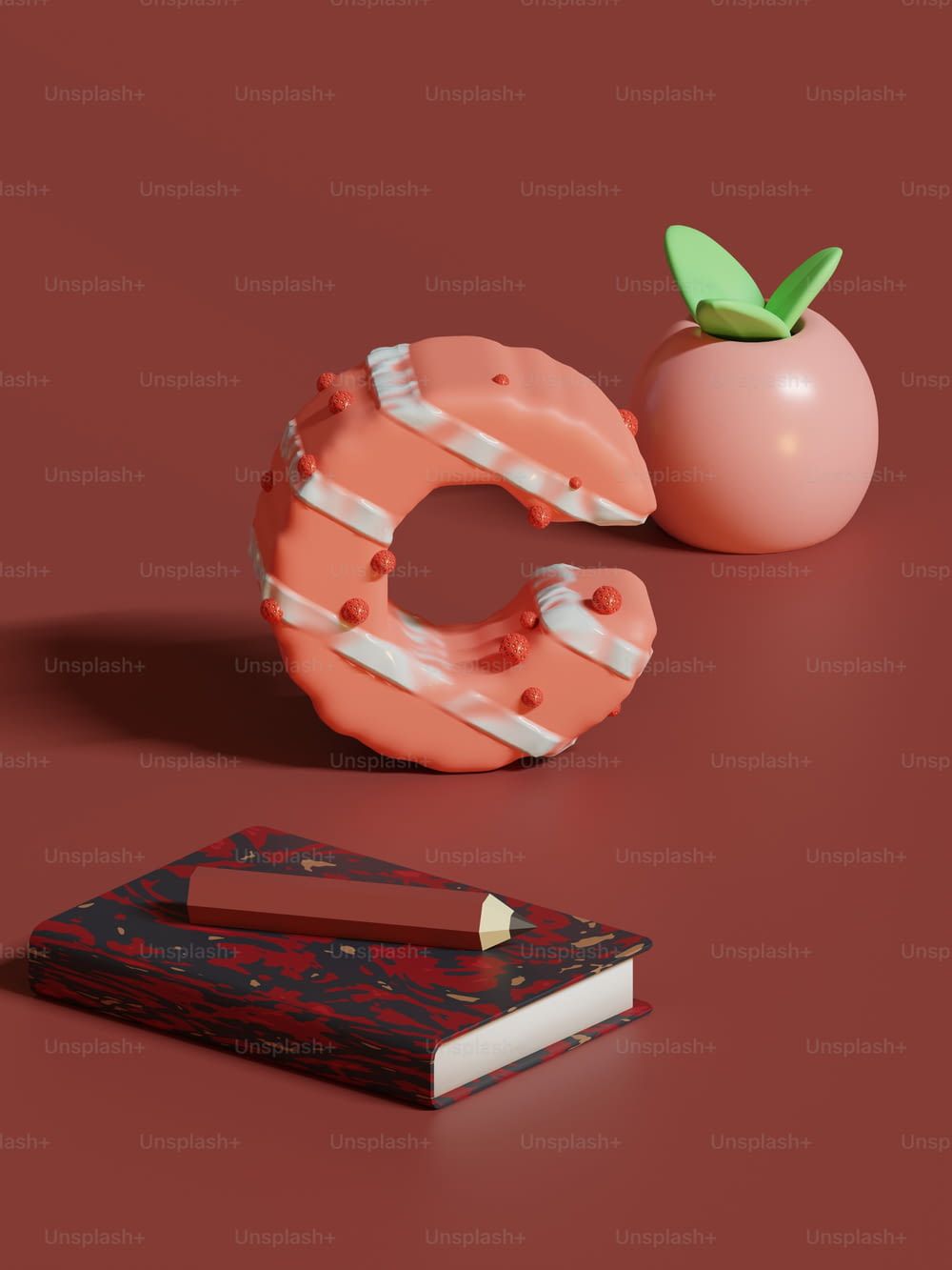 Un libro y una pieza de fruta en una mesa