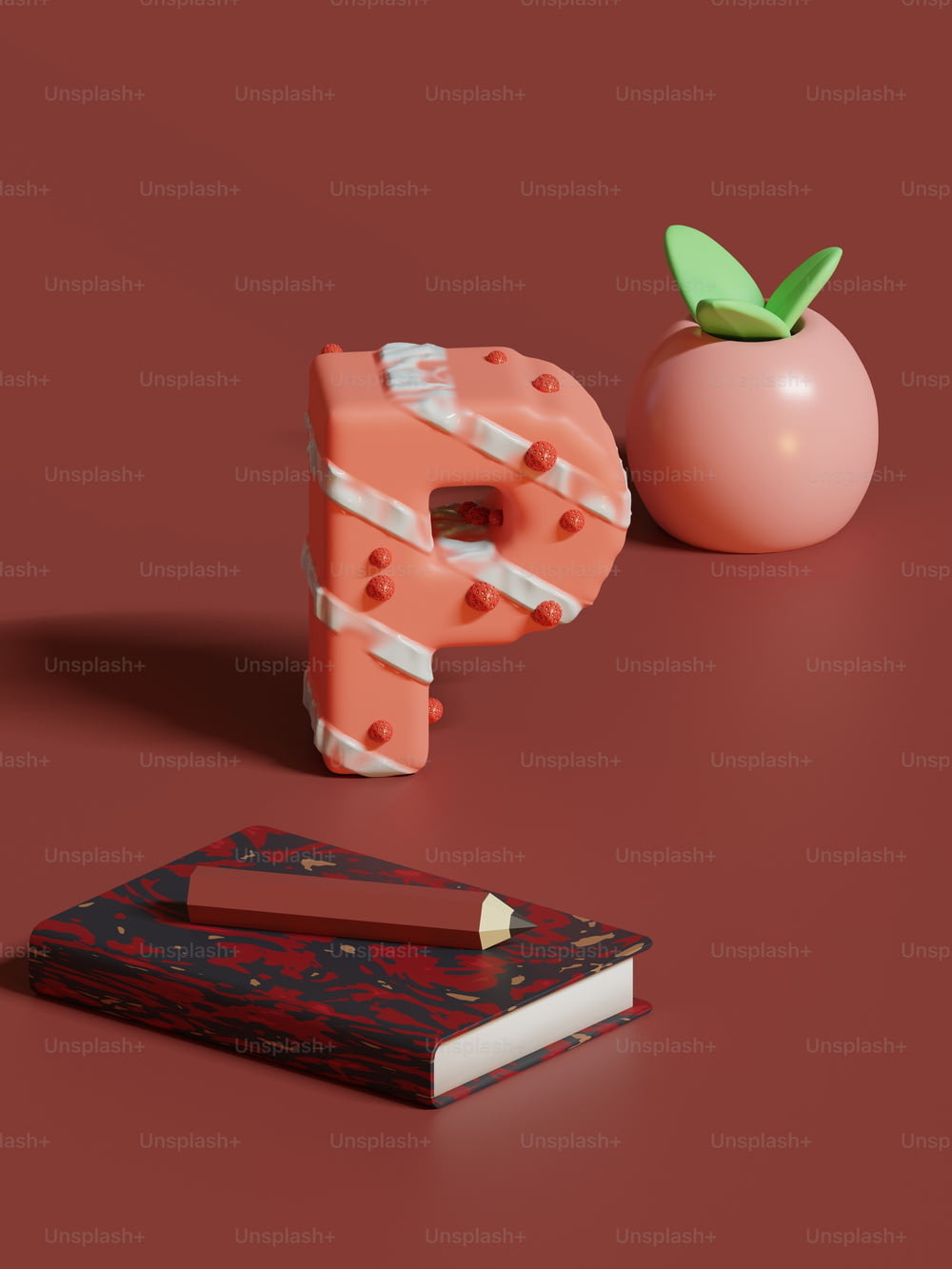 a piece of fruit sitting next to a book