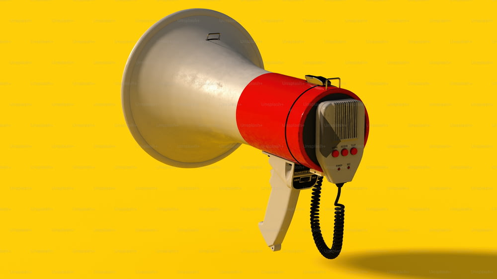 a red and white megaphone on a yellow background
