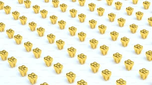 Un gran grupo de objetos de oro sobre una superficie blanca