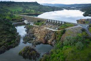 an aerial view of a dam in the middle of a river
