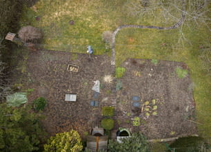 an aerial view of a yard with a lot of trees
