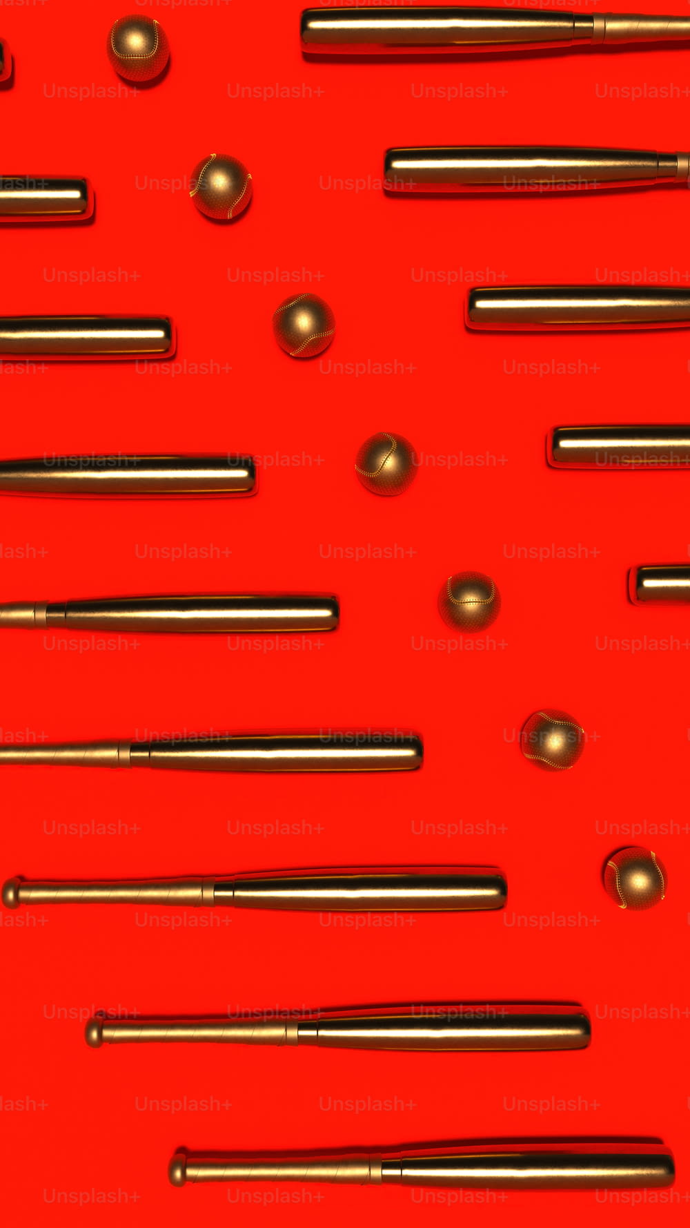 a group of different types of pens on a red surface