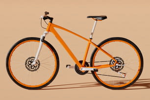an orange bike with black spokes on a tan background