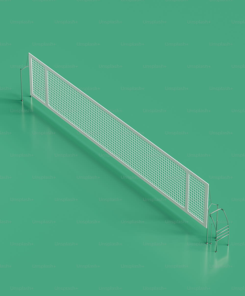 Una valla blanca sobre un fondo verde