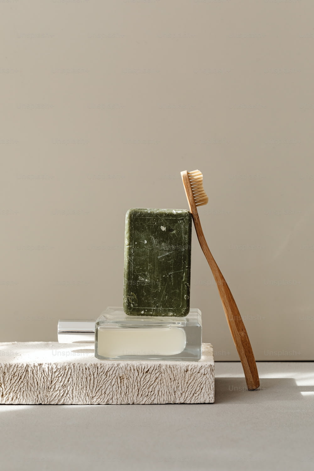 a toothbrush sitting on top of a block of soap