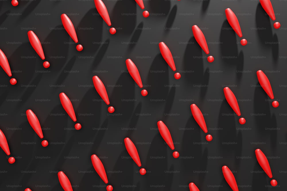 Un montón de objetos rojos que están en una superficie negra