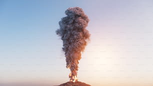 a large plume of smoke rising from the top of a mountain